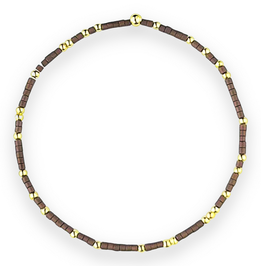 A Bracelet made with Dark Brown Seed Bead and Gold