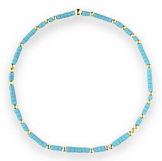 A bracelet made from Bahama Blue Seed Bead and gold